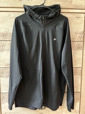 NWOT - Fabletics 
Men’s Black light weight Full-Zip Performance Hooded Jacket